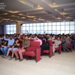 Engaged audience raising hands at Alibaba export seminar led by Atif Nazeer.